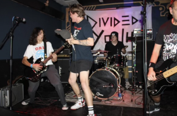 Divided Youth performs at Cafe Colonial. Guitarist Nicky Vaughan is pictured on the left.